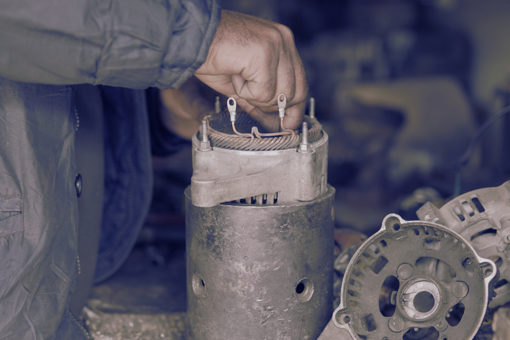 mechanic working on coils